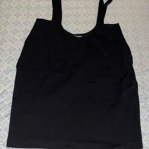 BLACK OVERALL MINI SKIRT SIZE MEDIUM